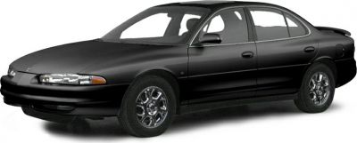 Four-door sedan front side view with alloy wheels