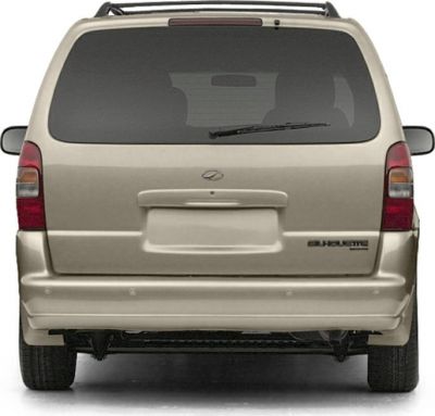 Rear view showing rear window wiper and roof rack on minivan.