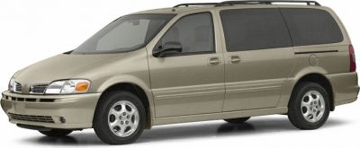 Side profile of a minivan with sliding doors and alloy wheels