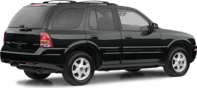 Rear right side view of a black SUV with alloy wheels and roof rack