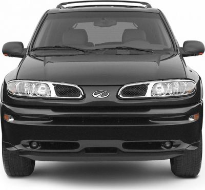 Front view with grille, dual headlights, and hood details