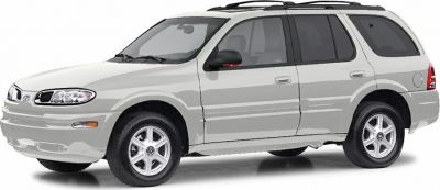 Side profile of a mid-size SUV with alloy wheels and roof rack