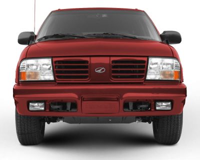 Front view of vintage SUV with distinctive grille and headlights