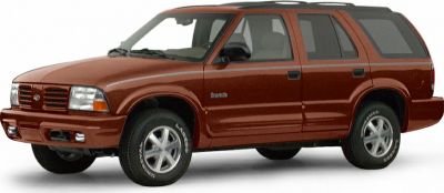 Mid-90s four-door mid-size SUV with rugged styling and roof rails