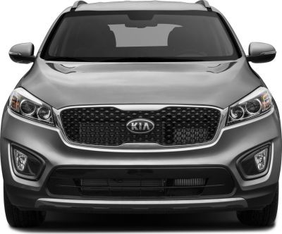 Front view with prominent grille and dual projector headlights