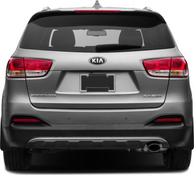 Rear view featuring tail lights, spoiler, and exhaust pipe