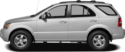 Side profile of silver mid-size SUV with alloy wheels