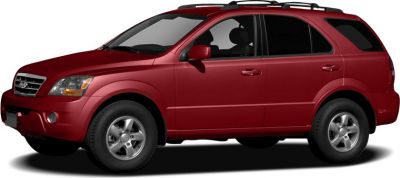 Side profile of a red compact SUV with five doors and roof rails.