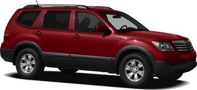 SUV side profile with silver alloy wheels and roof rails