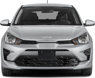Front view showing grille and headlight design
