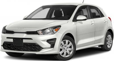 White compact hatchback with modern headlights and aerodynamic design