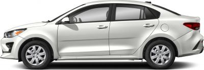 Side profile of white compact sedan with alloy wheels