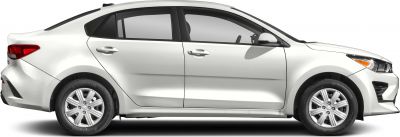 Side profile of a compact sedan with aerodynamic design and alloy wheels