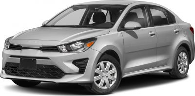 Silver compact sedan with sharp headlights and aerodynamic front design