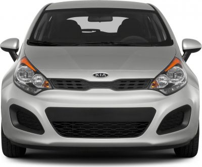 Front view with distinctive headlights and grille