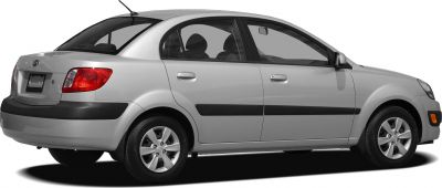 Side view of a sedan with alloy wheels and black side trim