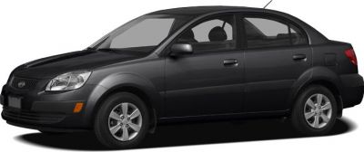 Compact sedan with halogen headlights and alloy wheels in black