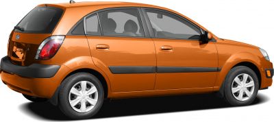 Orange hatchback side view with black bumper and alloy wheels
