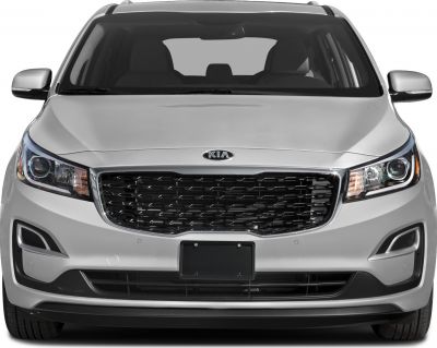 Front grille and headlights of a minivan front view