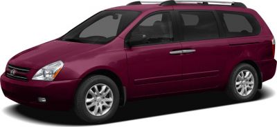 Minivan with roof rails, alloy wheels, and sliding side door.