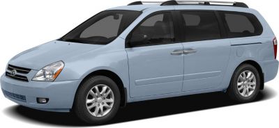 Side profile of a minivan with sliding door and roof rails