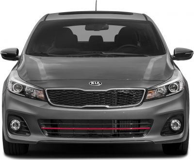 Front view with grille, headlights, fog lamps, and side mirrors