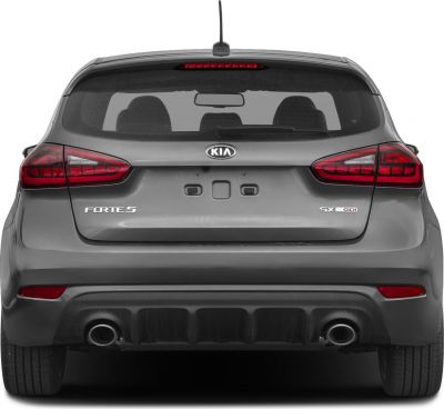 Rear hatchback view with dual exhaust and modern taillights