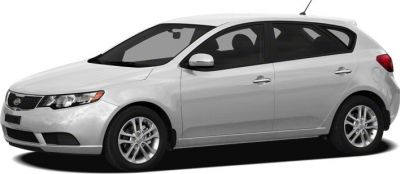 White hatchback car side profile featuring aerodynamic design and alloy wheels.