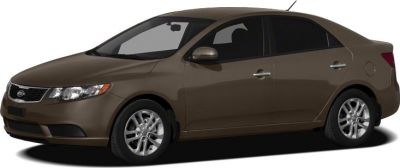 Brown sedan viewed from front-side angle with alloy wheels