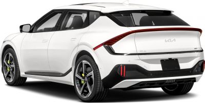 Rear and side profile of a white electric SUV with aerodynamic design and distinctive tail lights