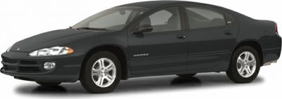 Aerodynamic black sedan with distinctive alloy wheels and headlights