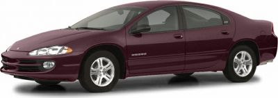 Front side view of a sedan with aerodynamic body and distinct headlights.