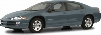 Front side view of a sedan with aerodynamic design and alloy wheels