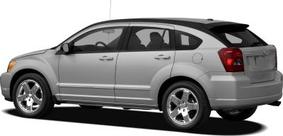 Side profile of hatchback with chrome wheels and rear spoiler