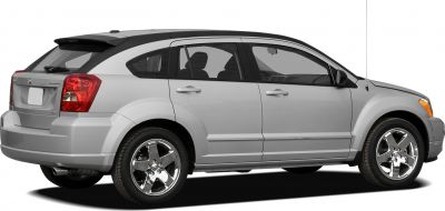 Rear side profile with roof spoiler and chrome five-spoke wheels