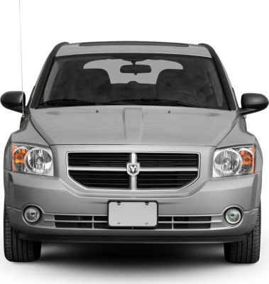 Front view showing coupe headlight design and distinctive grille