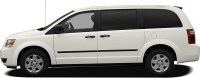 Side view of white minivan with sliding doors and tinted windows.