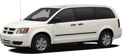 White minivan with sliding doors and tinted windows, front-side angle