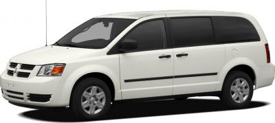 White minivan with sliding doors and spacious side profile