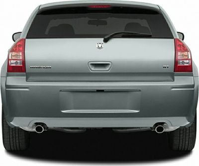 Rear view with dual exhaust pipes, rear wiper, and distinct tailgate design.