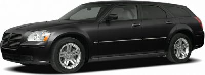 Sleek side profile of a station wagon with alloy wheels and long roofline.