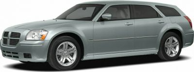 Side profile of a station wagon with alloy wheels and tinted windows.