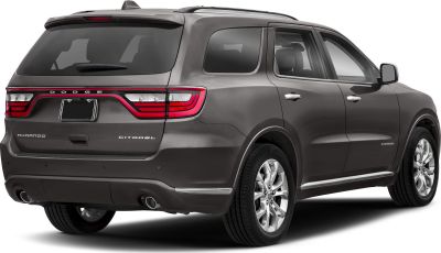 Rear side view with LED taillights and dual exhaust pipes on a modern SUV