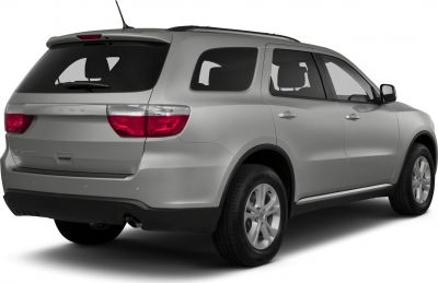 Rear and side view of silver SUV with taillights and wheels