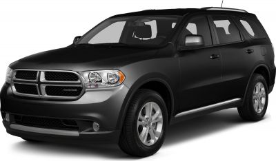 Front side view of SUV with distinctive grille and headlights
