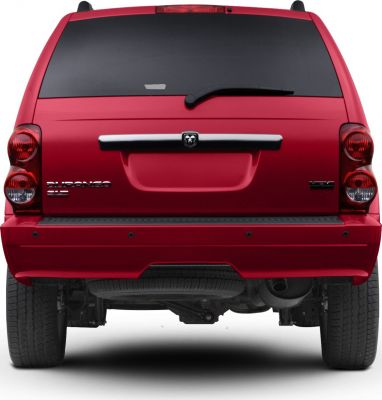 Rear view of SUV with HEMI badge, rear wiper, tail lights, and parking sensors