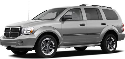 Silver midsize SUV with chrome alloy wheels and modern design
