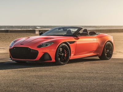 Convertible sports car with aggressive front grille and sleek aerodynamic design