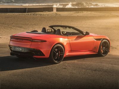 Convertible rear and side profile with black alloy wheels and dual exhaust
