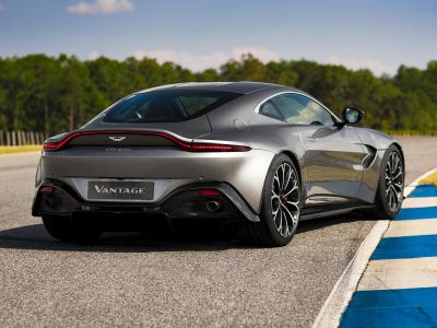 Rear view of a sleek sports coupe with distinctive taillights and aerodynamic curves